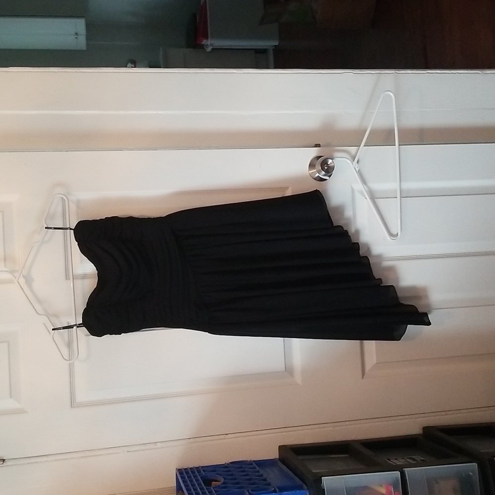 Womans black dress strapless asymmetrical